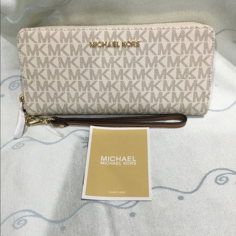 Authentic brand Michael Kors Wristlet